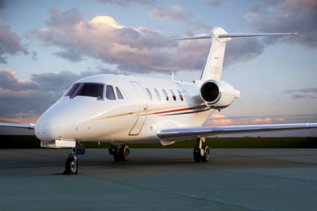 **location jet privé** : Citation VII au coucher du soleil.